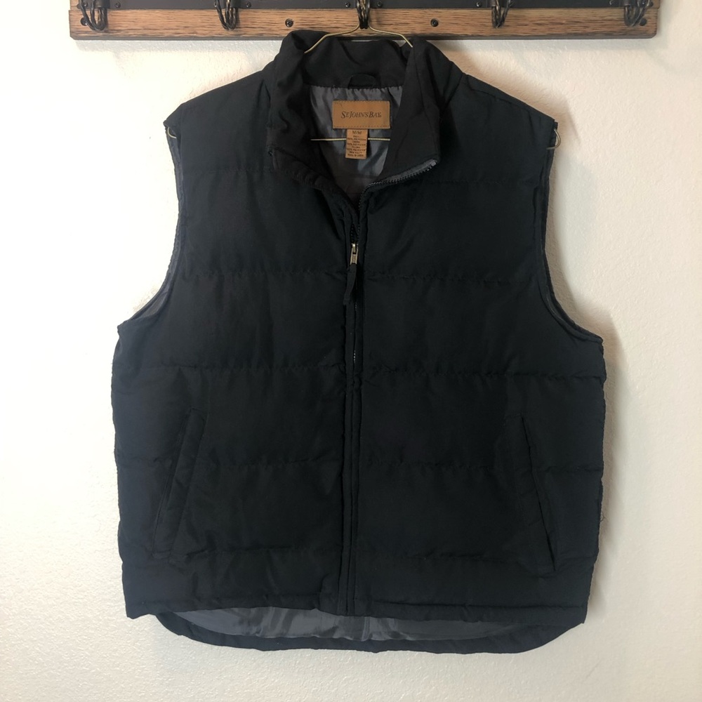 Black puffer vest.